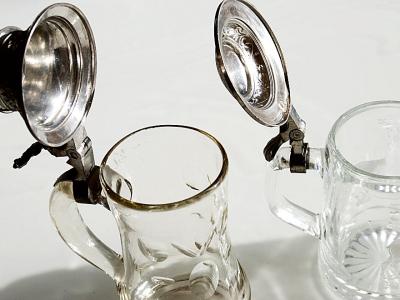 2 beer mugs, glass, tin lid decorated