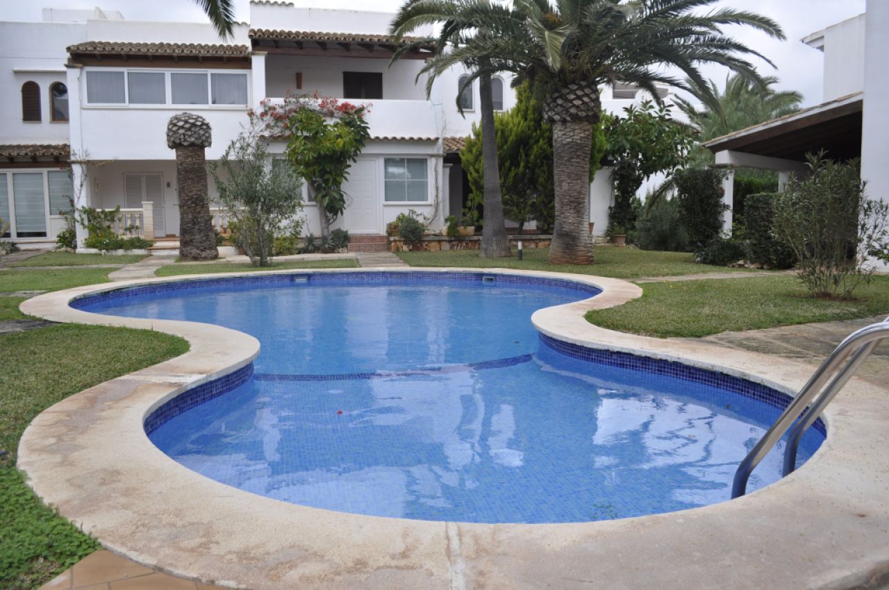 Chalet de 2 plantas con piscinas comunitarias, Ac en Marina Dor - Cala Dor-- CH 116