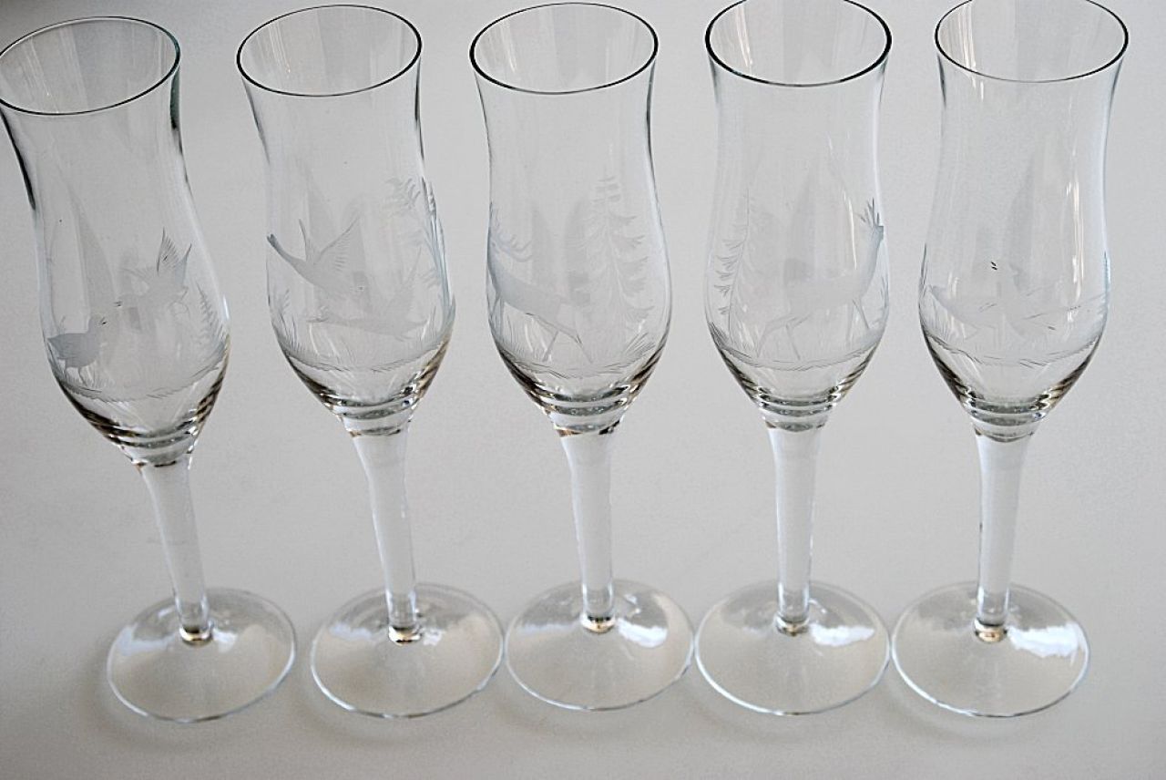 5 champagne glasses with hand-cut pictures