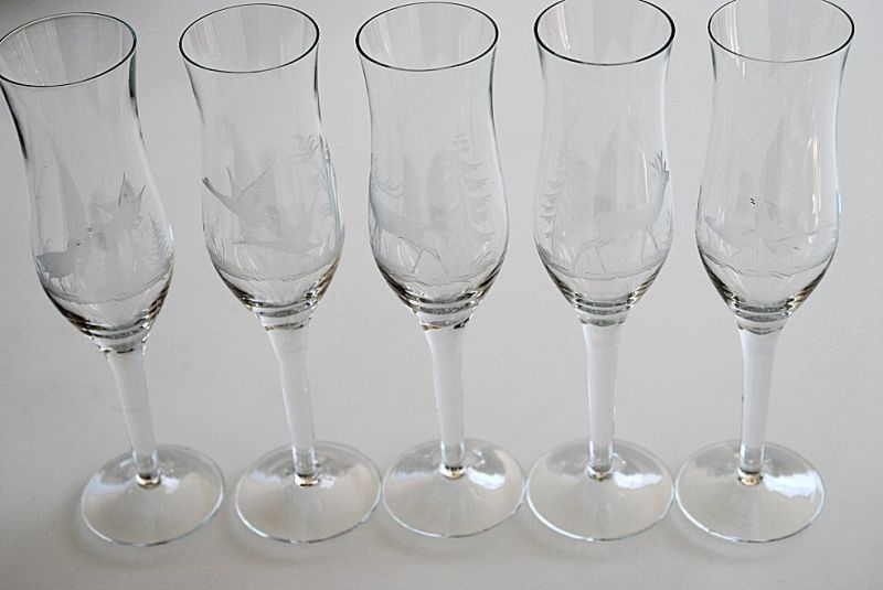 5 champagne glasses with hand-cut pictures