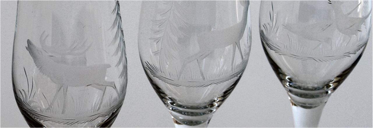 5 champagne glasses with hand-cut pictures