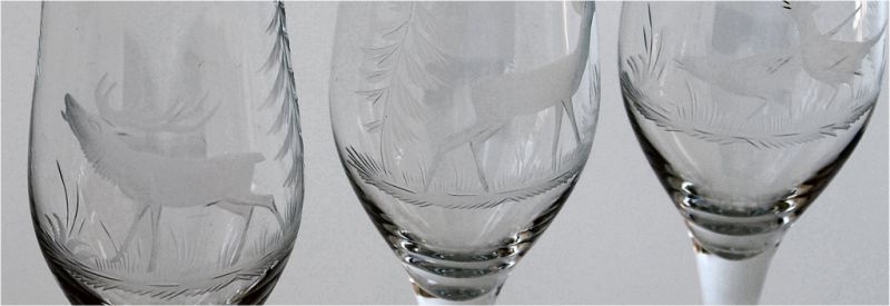 5 champagne glasses with hand-cut pictures