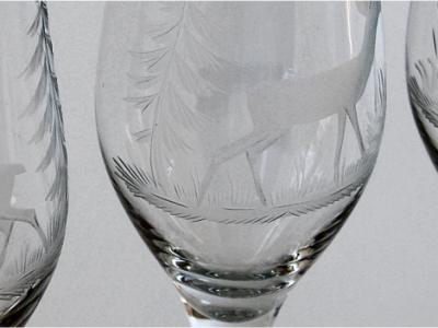 5 champagne glasses with hand-cut pictures
