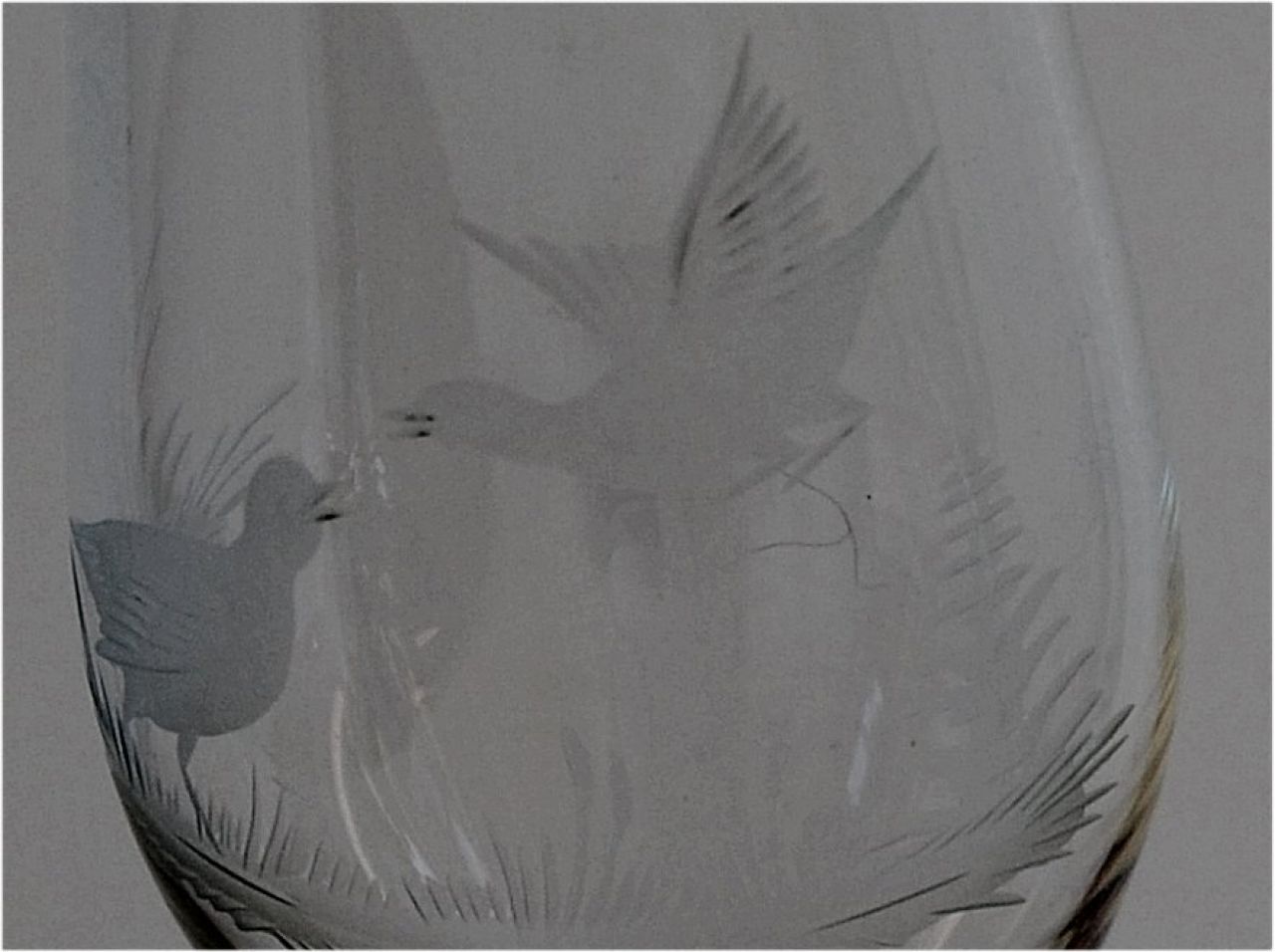 5 champagne glasses with hand-cut pictures