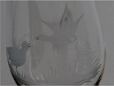 5 champagne glasses with hand-cut pictures