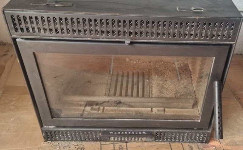 Ausgezeichneter *Spartherm*. Holzkamineinsatz aus Gusseisen.