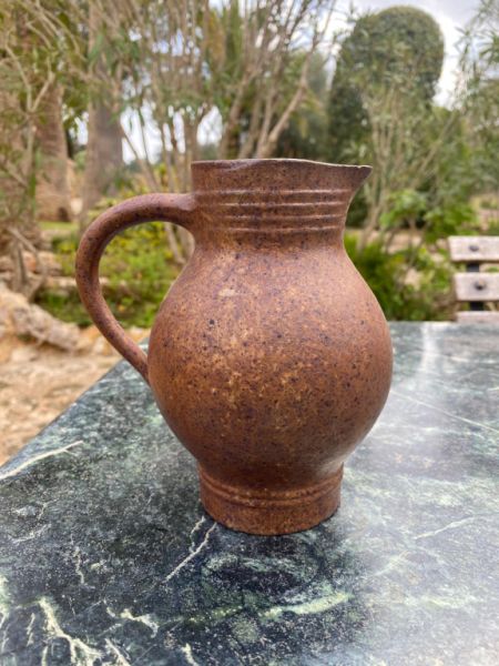 DECORATIVE clay jug