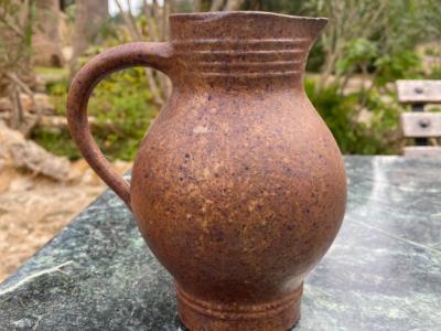 DECORATIVE clay jug