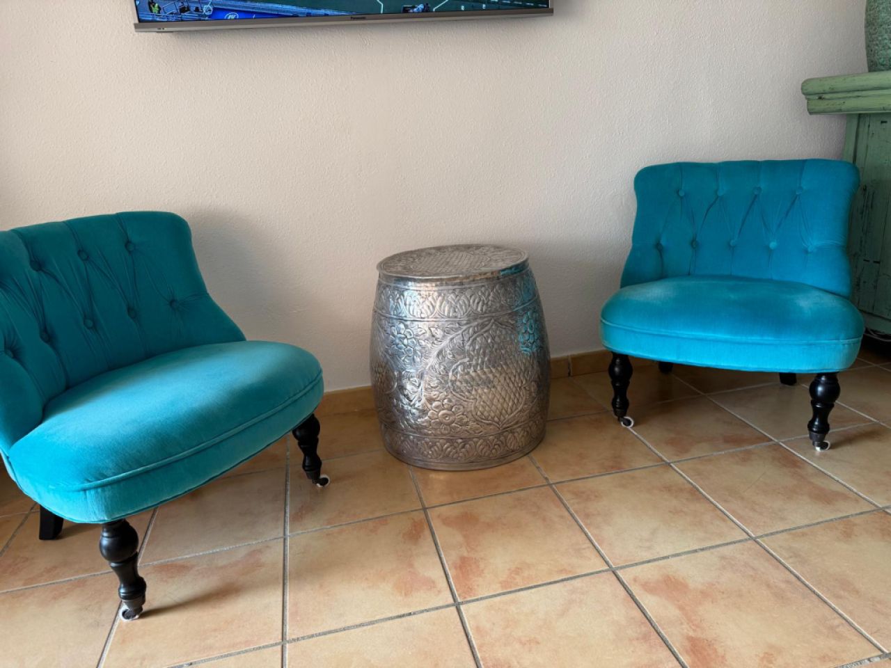 Elegant lounge chairs with oriental metal table