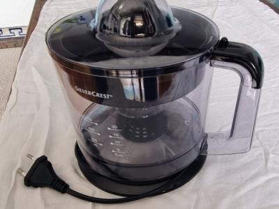 Electric juice press, citrus juicer, available.