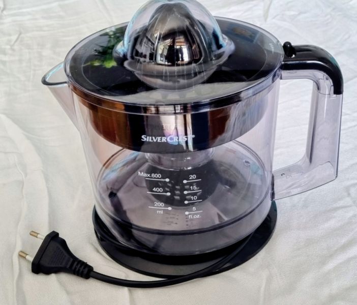 Electric juice press, citrus juicer, available.