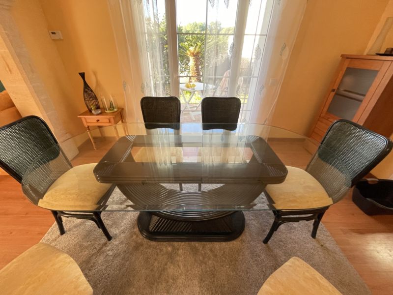Glass dining table with 6 chairs