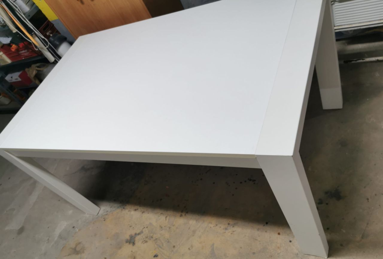 White solid wood extendable dining table