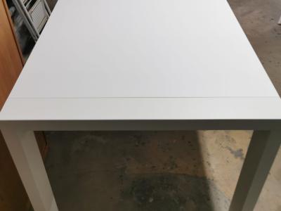 White solid wood extendable dining table