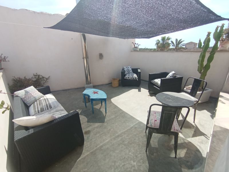 Ferienvermietung eines schönen Dorhauses mit Innenhof und Terrasse in Es LLombards --- DH 12 FZ