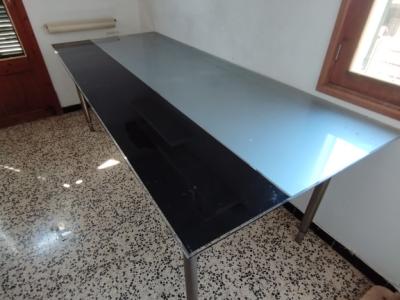 Glass table with stainless steel base