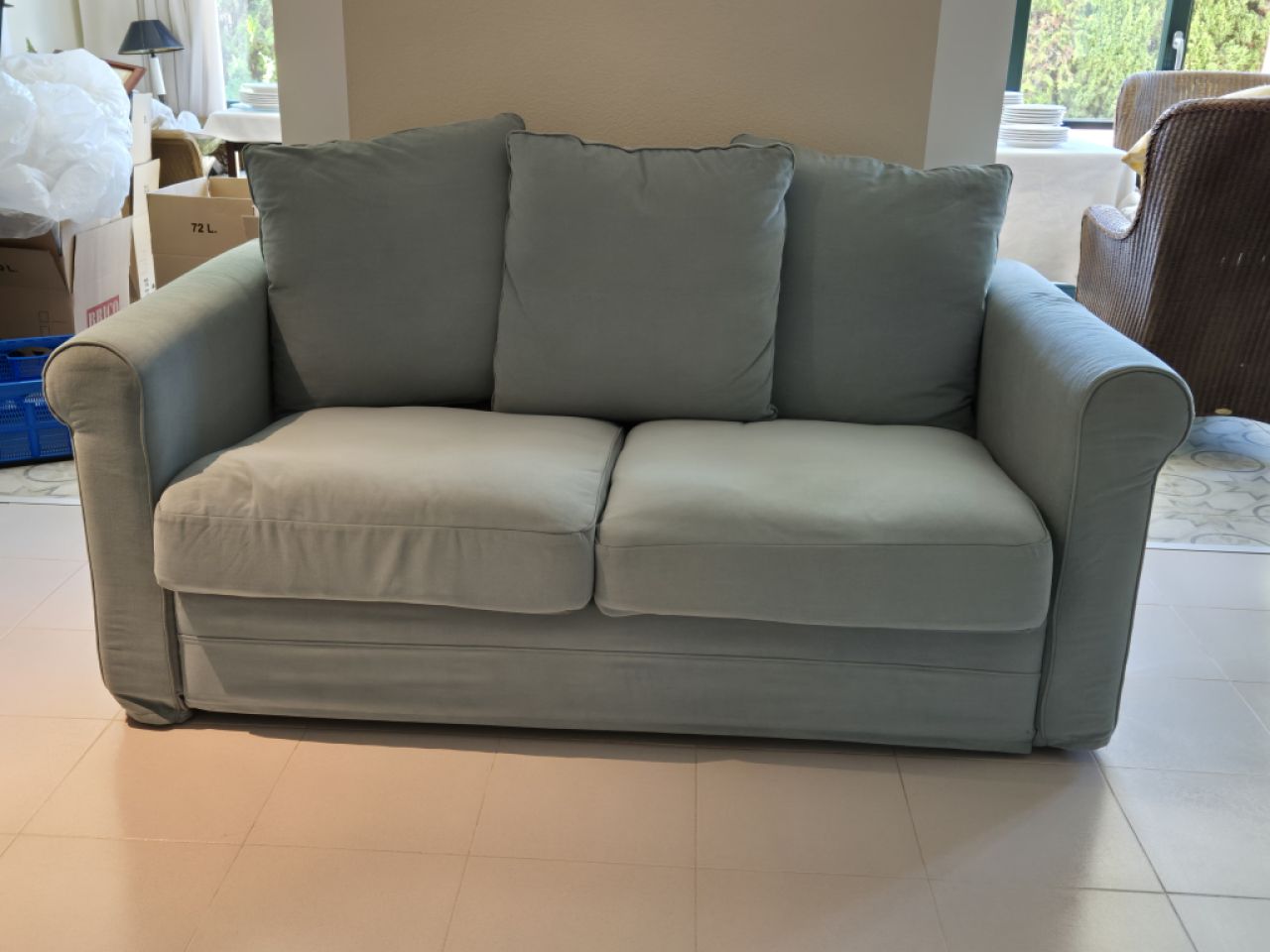Green 2‑seater sofa like new"!