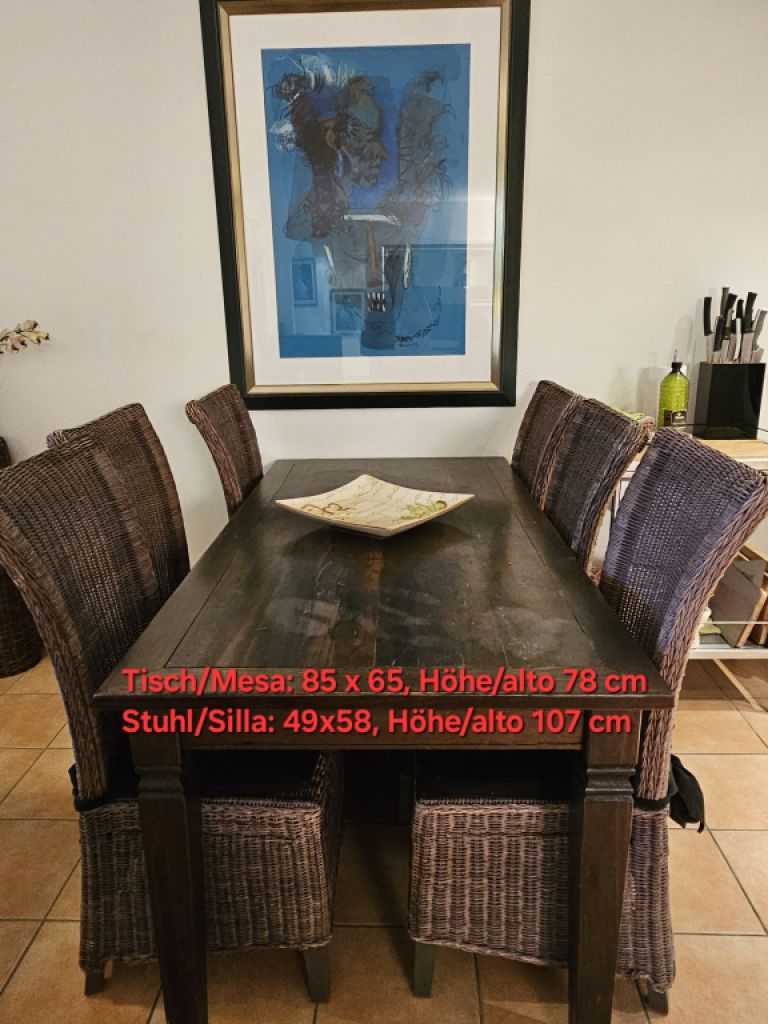 Solid wooden table with 6 wicker chairs