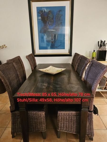 Solid wooden table with 6 wicker chairs