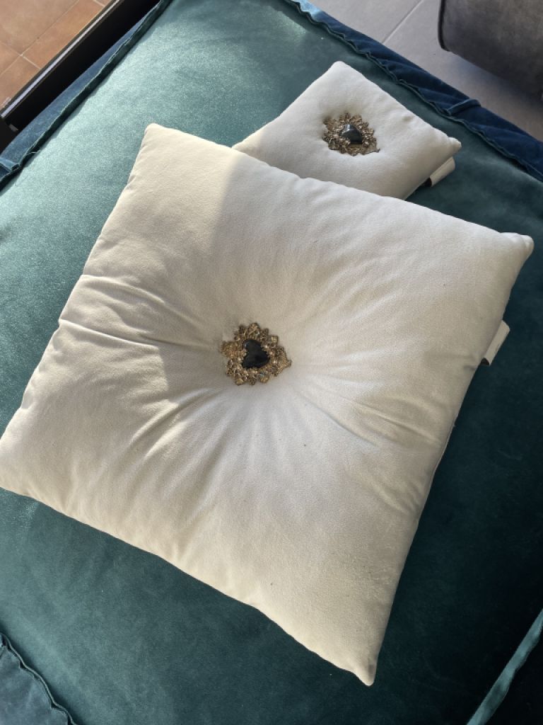 Cushions large and small in light blue