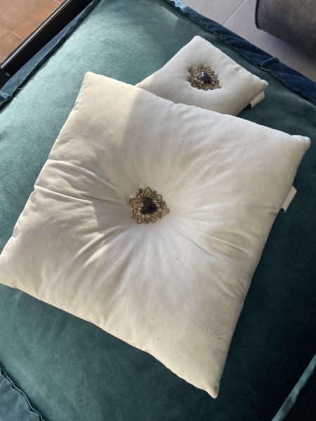 Cushions large and small in light blue