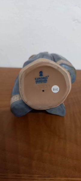 Lladro gres small peasant girl, blue