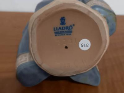 Lladro gres small peasant girl, blue
