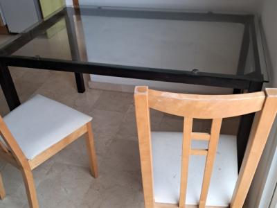 Metal table with glass top