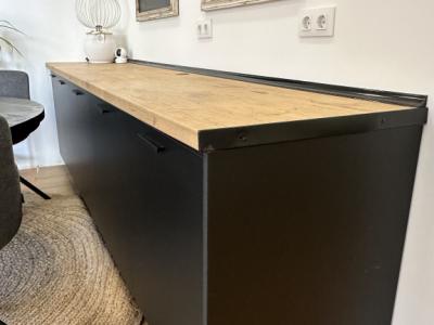 Modern kitchen unit with stylish black fronts and wood-effect worktop for sale