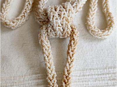 Perlenkette mit Quaste auch bekannt als Sautoir