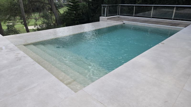Pool renovation: new tiles, pool liner or coating