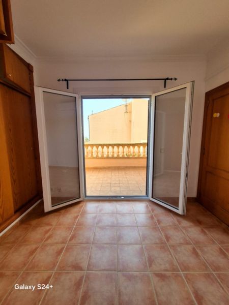 Reihenhaus-Chalet im Wohngebiet von Cala Mandia