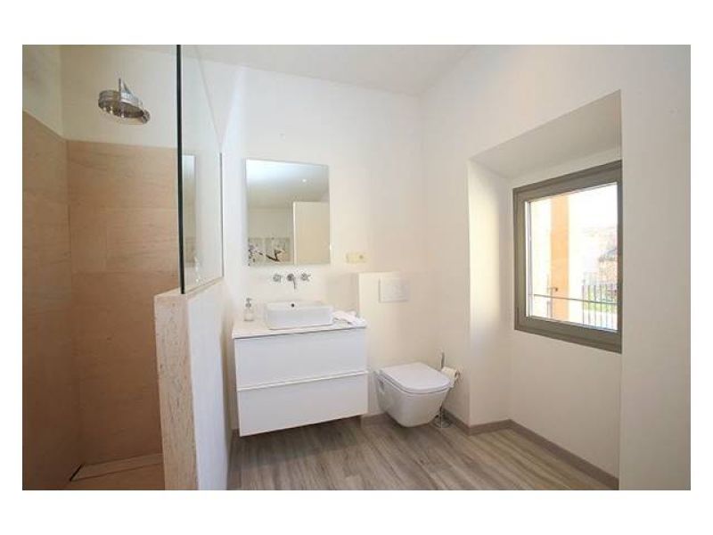 SEASON 25 / 26: Renovated, modern village house with courtyard in San Llorenc -- DH 08 WT