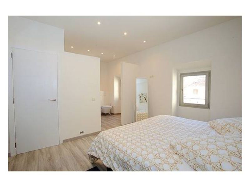 SEASON 25 / 26: Renovated, modern village house with courtyard in San Llorenc -- DH 08 WT