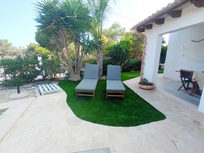 Saison: Chalet mit Fussbodenheizung, Garten und Pool in Cala LLombards -- CH 07 T