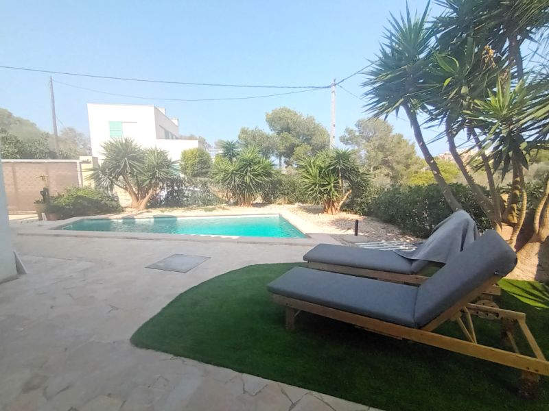 Saison: Chalet mit Fussbodenheizung, Garten und Pool in Cala LLombards -- CH 07 T