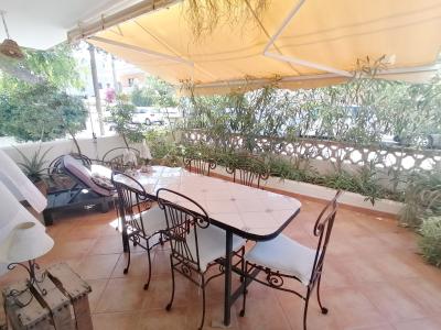 SAISON: Parterreapartment mit Garten/ Terrassen in Colonia St Jordi -- AP 07 T
