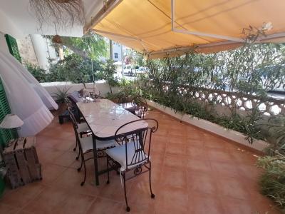 SAISON: Parterreapartment mit Garten/ Terrassen in Colonia St Jordi -- AP 07 T