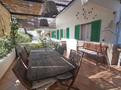 SAISON: Parterreapartment mit Garten/ Terrassen in Colonia St Jordi -- AP 07 T