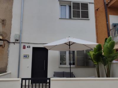 Season: Beautiful terraced house with plenty of comfort and terraces in S'Illot -- RH 13 T