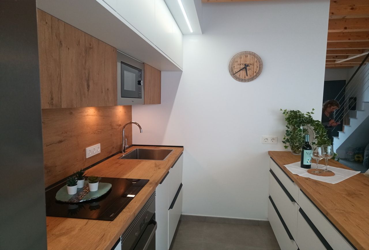 Saison: Schönes Reihenhaus mit viel Komfort und Terrassen in S Illot -- RH 13 T