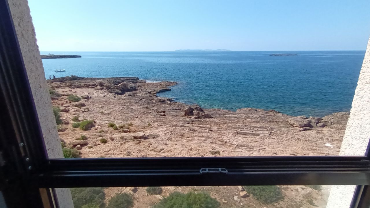 Season 26/27: Modern apartment in first line of the coast of St Jordi --- AP 10 T