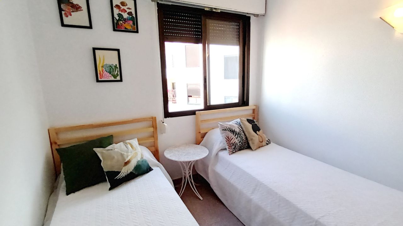 Season 26/27: Modern apartment in first line of the coast of St Jordi --- AP 10 T