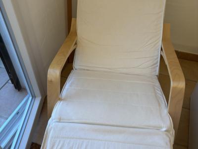 Rocking chair with foldable footrest