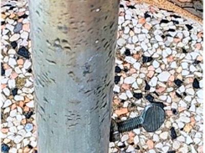 Round umbrella base made of concrete and stainless steel tube