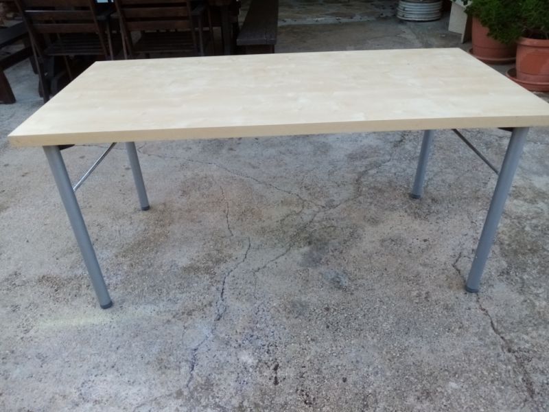 Nice light brown dining table to be delivered cheaply