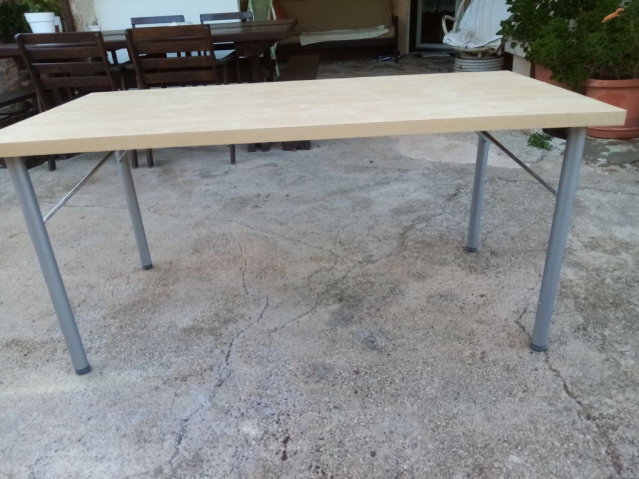 Nice light brown dining table to be delivered cheaply