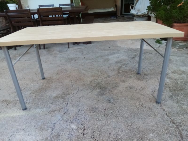 Nice light brown dining table to be delivered cheaply