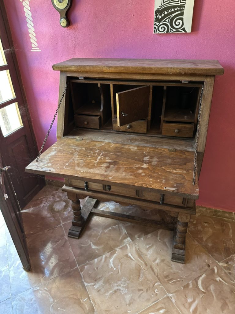 Solid, massive wooden secretary with various compartments and drawers