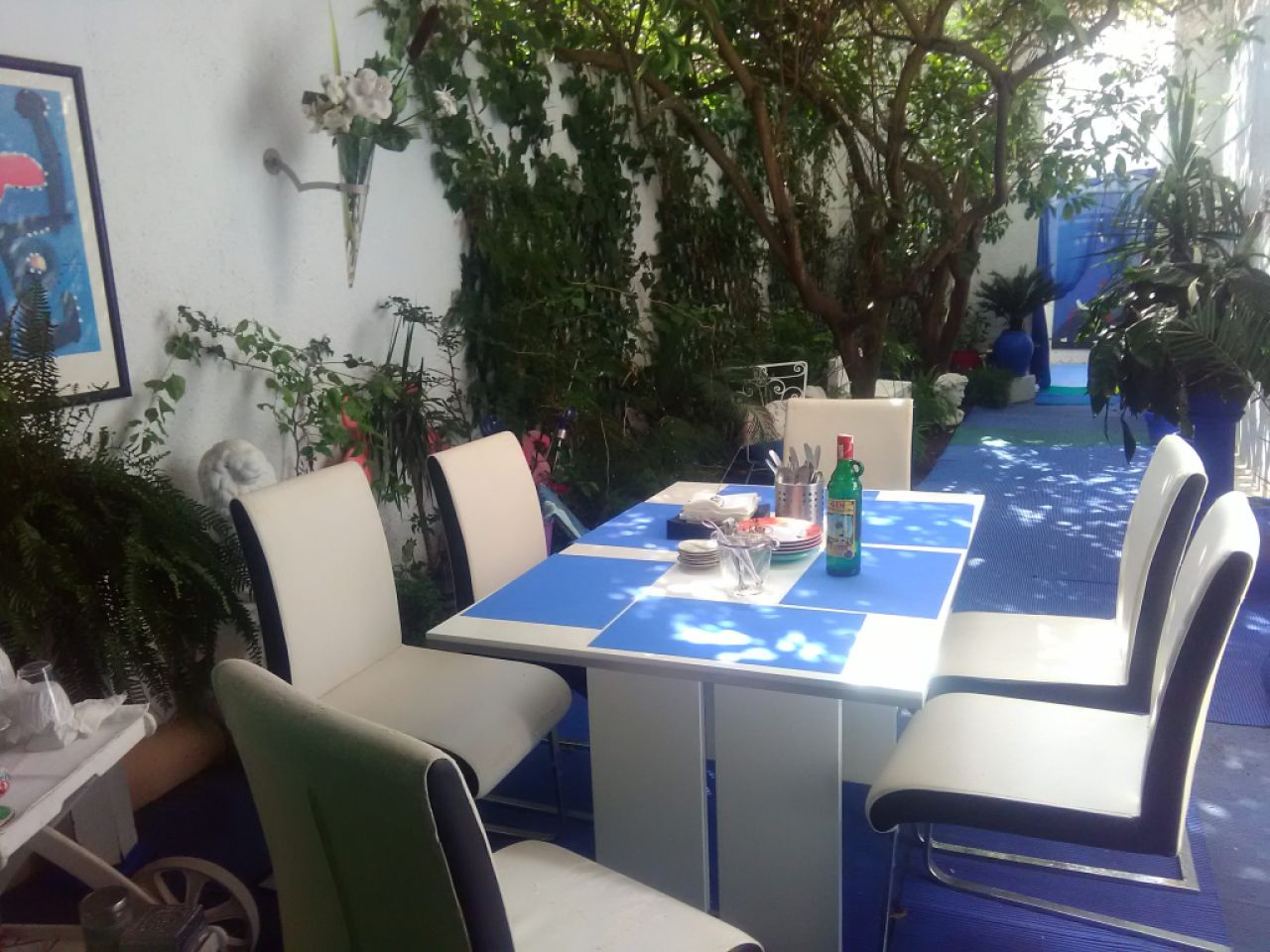 Mesa de terraza con 5 sillas